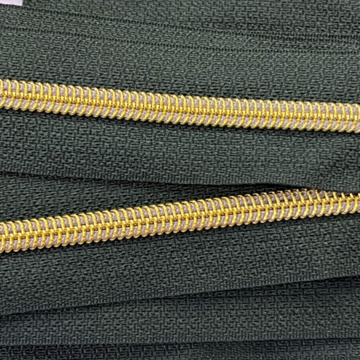 Reissverschluss 6.5 mm - schwarz / gold