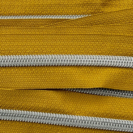 Reissverschluss 6.5 mm - curry / silber